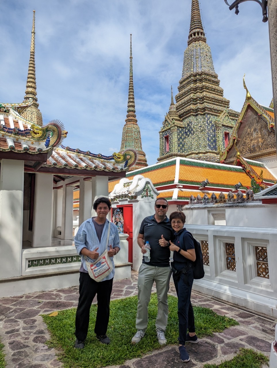 Group photo at Grand Palace, left to right: Htun Teza, Gareth McKay, Ammarin Thakkinstian